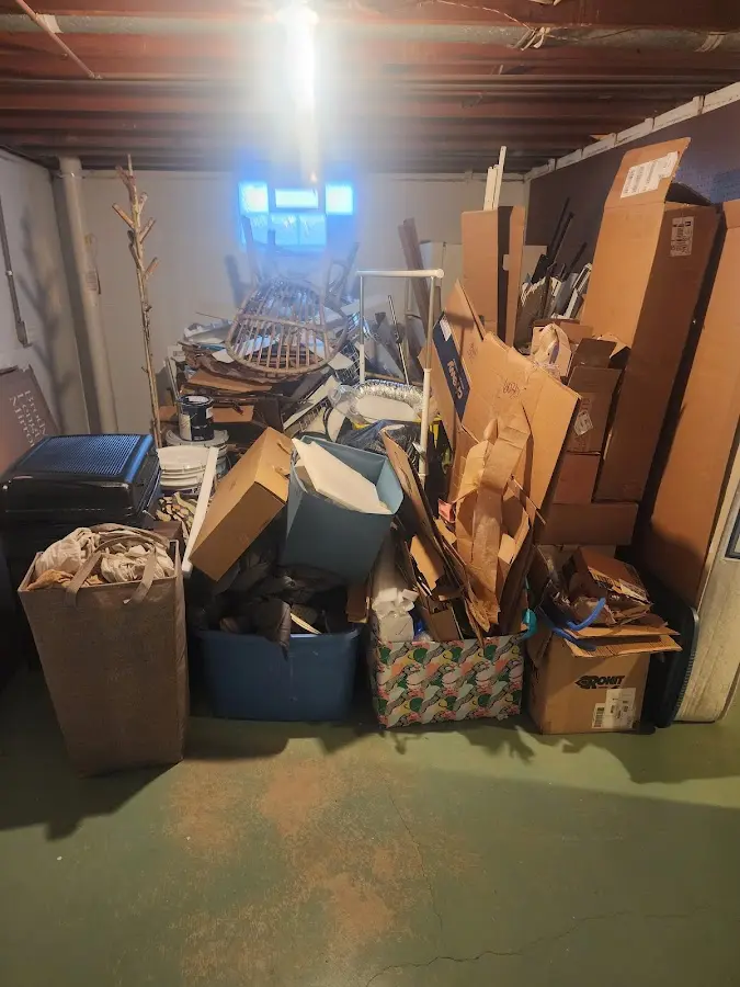 Roll-off dumpster container at job site for Concrete Dumpster Rental in Highlands